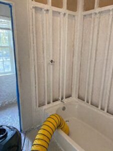 Treated shower wall framing after mold remediation in Layton UT