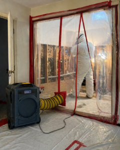 Mold remediation containment set up with HEPA scrubber in Utah home