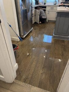 Kitchen flooded by refrigerator ice maker line failure in Layton UT