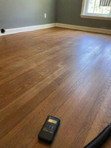 Hardwood floors dried and restored after washing machine overflow in Layton UT